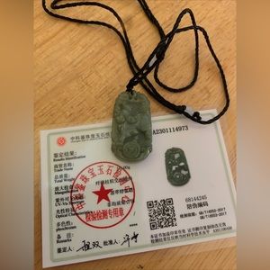 Oily jadeite 1 1/2 inch year of the pig pendant with certificate of authenticity